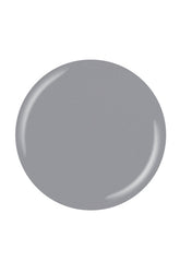 A circular shape of China Glaze lacquer sample swatch featuring its gray hue